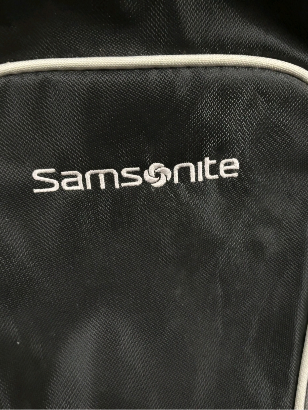 Samsonite Black Travel Backpack with White Trim Accents